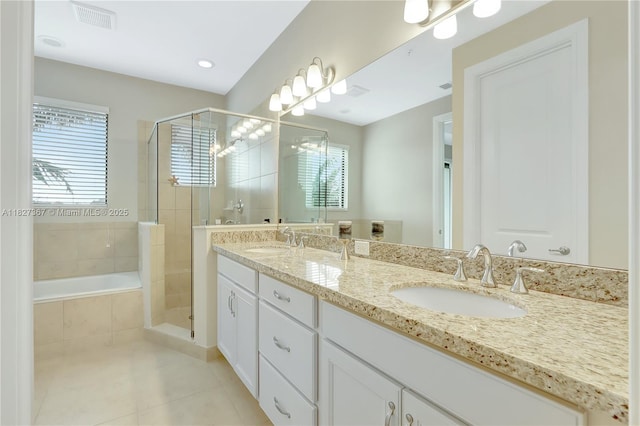 1601 SW 113th Ave, Pembroke Pines, FL 33025 - full bathroom with double vanity, a shower stall, plenty of natural light, and tile patterned flooring