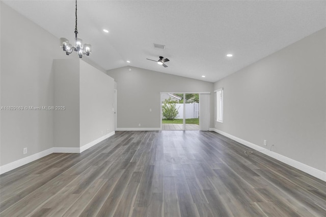 1592 Salerno Cir, Weston, FL 33327 - unfurnished living room featuring lofted ceiling, recessed lighting, dark wood-style floors, ceiling fan, and a chandelier