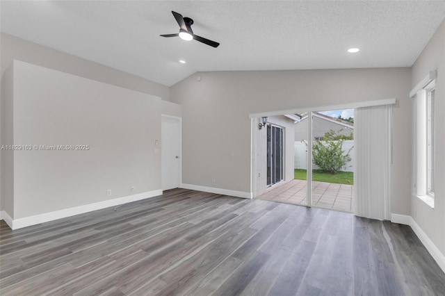 1592 Salerno Cir, Weston, FL 33327 - unfurnished room featuring a ceiling fan, vaulted ceiling, wood finished floors, recessed lighting, and a textured ceiling