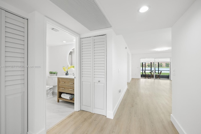 550 SW 138th Ave Unit 112K, Pembroke Pines, FL 33027 - hallway with light wood-type flooring and recessed lighting