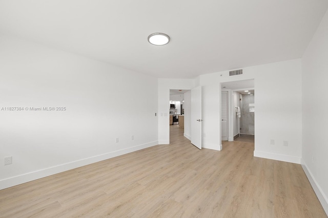 550 SW 138th Ave Unit 112K, Pembroke Pines, FL 33027 - unfurnished bedroom with light wood-style flooring and baseboards