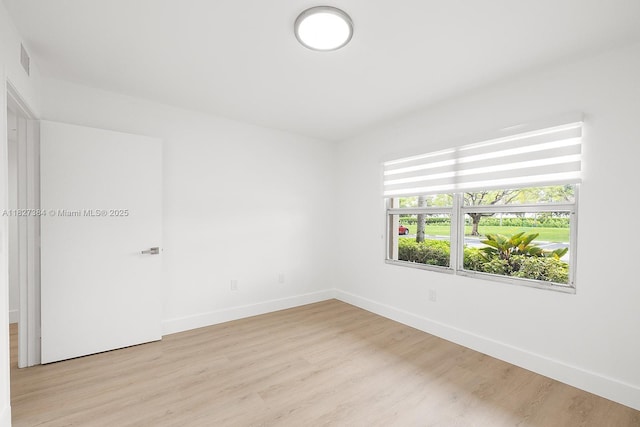 550 SW 138th Ave Unit 112K, Pembroke Pines, FL 33027 - empty room featuring light wood finished floors and baseboards
