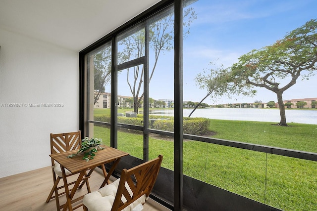 550 SW 138th Ave Unit 112K, Pembroke Pines, FL 33027 - sunroom with a water view and plenty of natural light