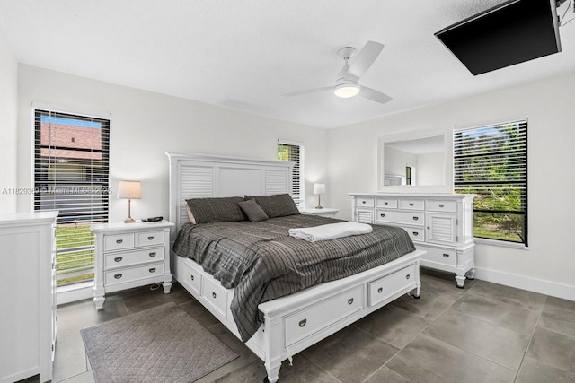 3693 N Arelia Dr N, Delray Beach, FL 33445 - bedroom featuring multiple windows and a ceiling fan
