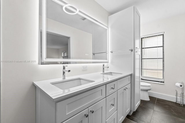 3693 N Arelia Dr N, Delray Beach, FL 33445 - full bathroom featuring toilet and double vanity