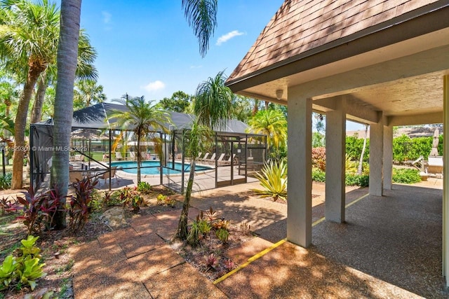 3693 N Arelia Dr N, Delray Beach, FL 33445 - community pool with a patio and glass enclosure