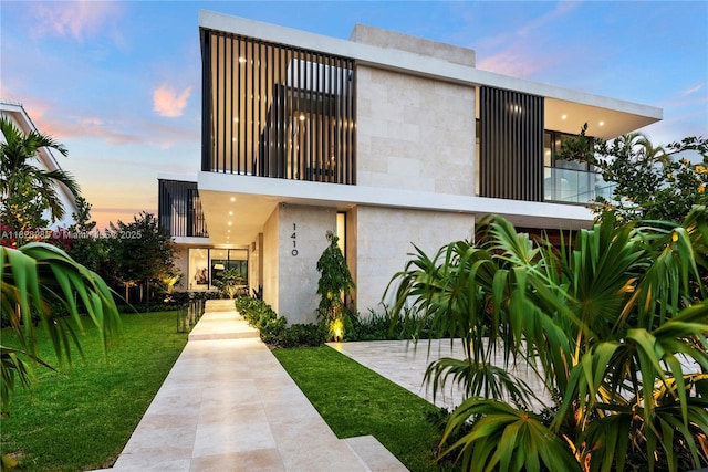 1410 S Biscayne Point Rd, Miami Beach, FL 33141 - view of side of property with a yard and a balcony