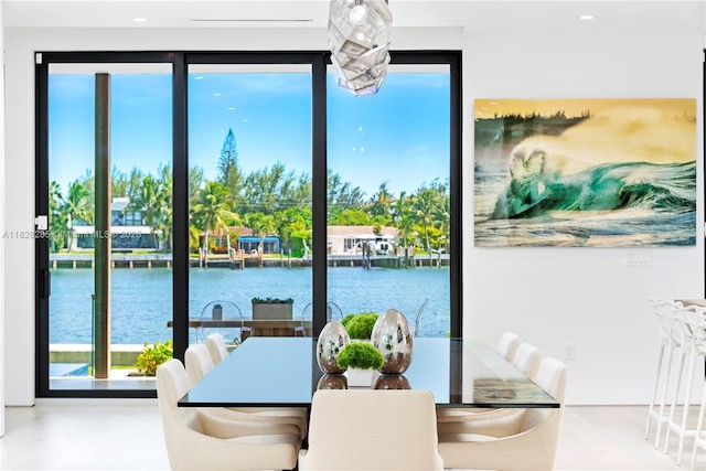 1410 S Biscayne Point Rd, Miami Beach, FL 33141 - dining space featuring a water view