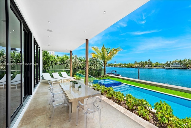 1410 S Biscayne Point Rd, Miami Beach, FL 33141 - balcony with a water view and a pool with connected hot tub