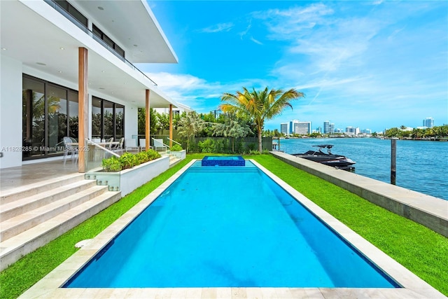 1410 S Biscayne Point Rd, Miami Beach, FL 33141 - swimming pool with a water view, a patio, and a view of city