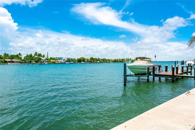 1410 S Biscayne Point Rd, Miami Beach, FL 33141 - dock featuring boat lift and a water view