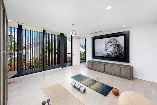 1410 S Biscayne Point Rd, Miami Beach, FL 33141 - cinema room with wood finished floors and recessed lighting