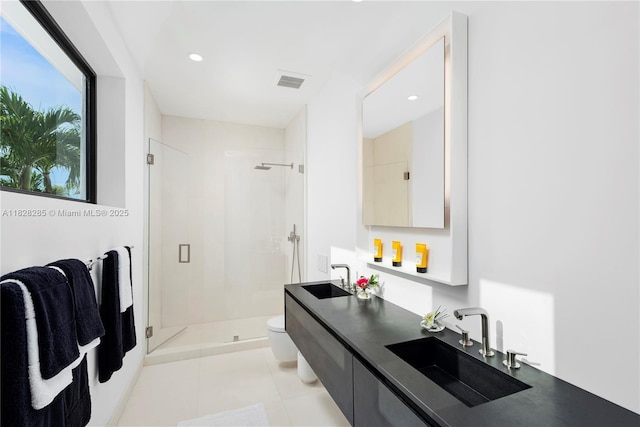 1410 S Biscayne Point Rd, Miami Beach, FL 33141 - full bathroom with a shower stall, double vanity, tile patterned floors, and recessed lighting