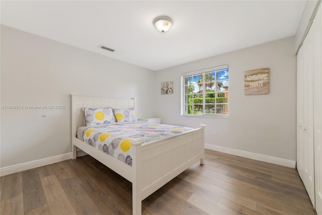 6198 SW 63rd St, South Miami, FL 33143 - bedroom with wood finished floors and baseboards