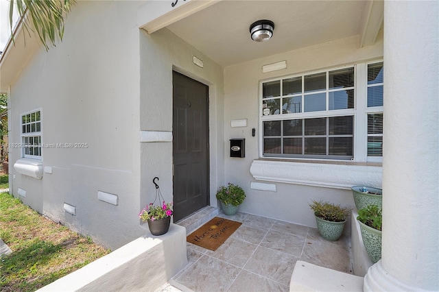 3301 NW 42nd St, Lauderdale Lakes, FL 33309 - property entrance featuring stucco siding