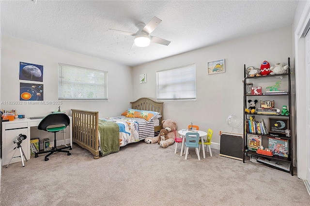 3301 NW 42nd St, Lauderdale Lakes, FL 33309 - bedroom featuring multiple windows, carpet floors, a textured ceiling, and ceiling fan