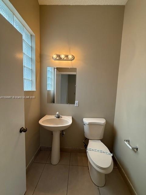 3736 SW 50th St, Hollywood, FL 33312 - bathroom with toilet and tile patterned flooring