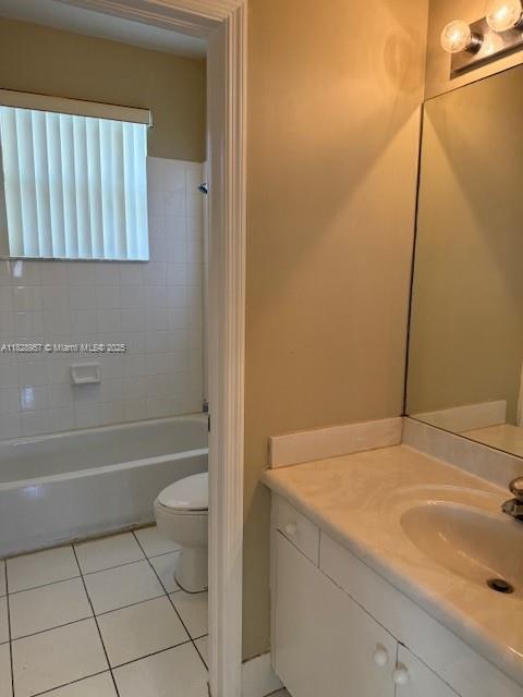 3736 SW 50th St, Hollywood, FL 33312 - bathroom with vanity, tile patterned flooring, and shower / bath combination