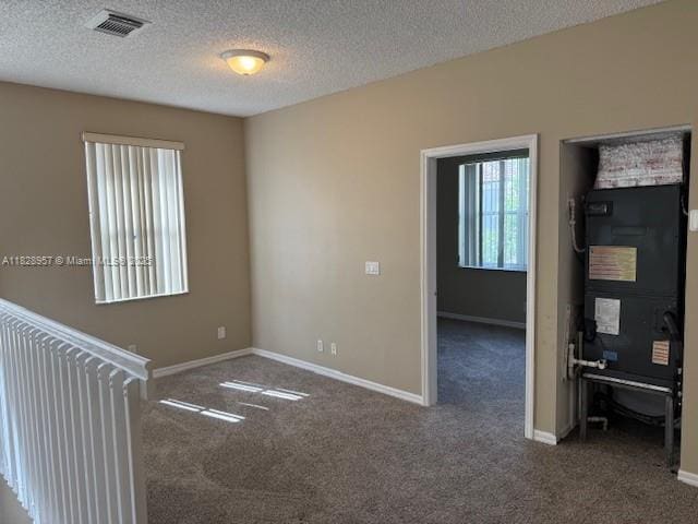 3736 SW 50th St, Hollywood, FL 33312 - carpeted spare room with baseboards and a textured ceiling