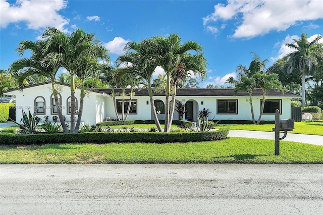 9745 SW 126th Ter, Miami, FL 33176 - view of front of house featuring a front lawn and stucco siding