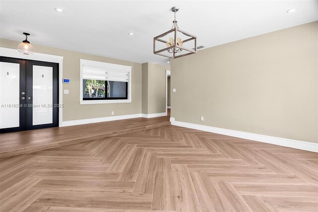 9745 SW 126th Ter, Miami, FL 33176 - empty room featuring a chandelier, french doors, and recessed lighting