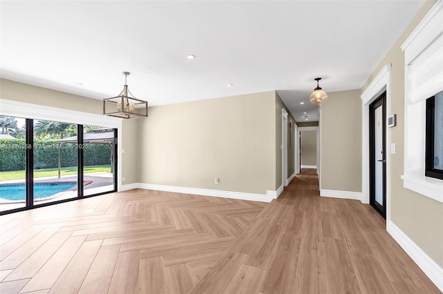 9745 SW 126th Ter, Miami, FL 33176 - spare room with a chandelier and recessed lighting