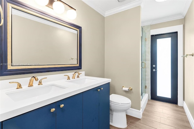 9745 SW 126th Ter, Miami, FL 33176 - bathroom with an enclosed shower, double vanity, wood finished floors, and ornamental molding