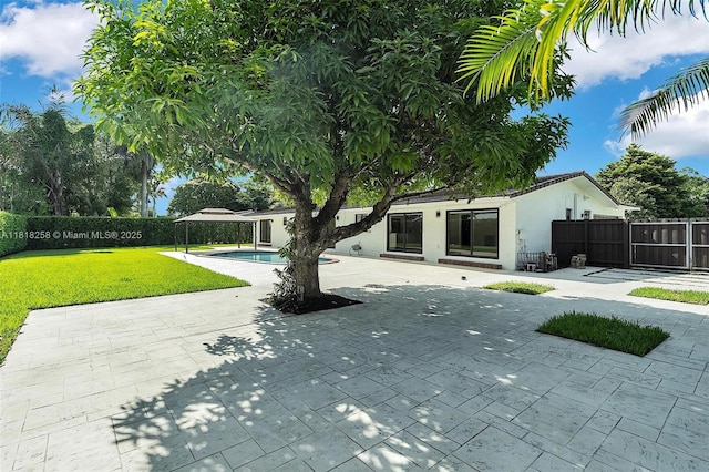 9745 SW 126th Ter, Miami, FL 33176 - fenced backyard featuring a patio