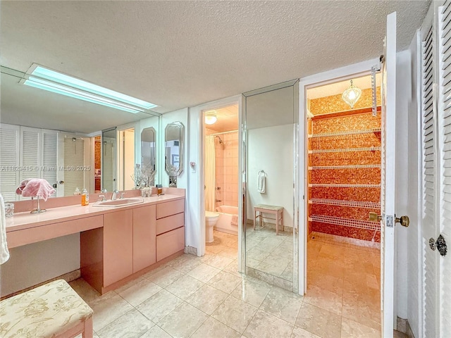 5701 Collins Ave Unit 417, Miami Beach, FL 33140 - full bath with vanity, a closet, shower / bathtub combination, a textured ceiling, and tile patterned floors