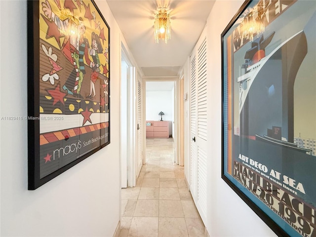 5701 Collins Ave Unit 417, Miami Beach, FL 33140 - corridor with tile patterned flooring and baseboards