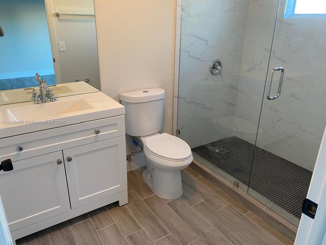 5521 SW 158th Ct, Miami, FL 33185 - full bathroom featuring a marble finish shower, vanity, and wood tiled floors