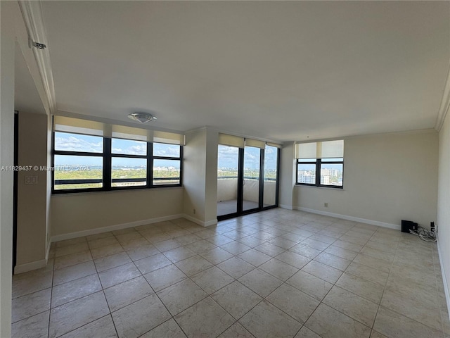 2555 Collins Ave Unit 2002, Miami Beach, FL 33140 - empty room with light tile patterned floors and ornamental molding
