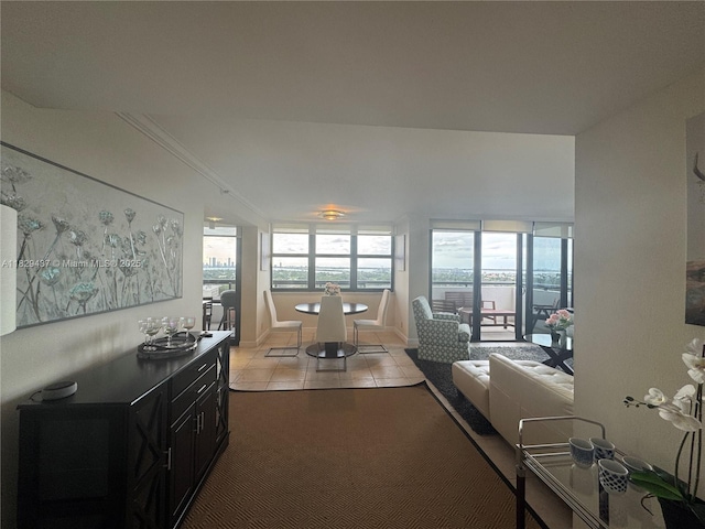 2555 Collins Ave Unit 2002, Miami Beach, FL 33140 - dining area featuring light tile patterned floors and baseboards