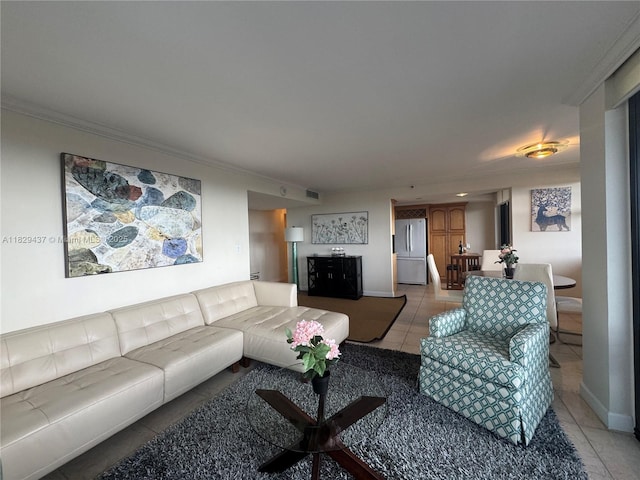 2555 Collins Ave Unit 2002, Miami Beach, FL 33140 - living room featuring light tile patterned flooring and ornamental molding