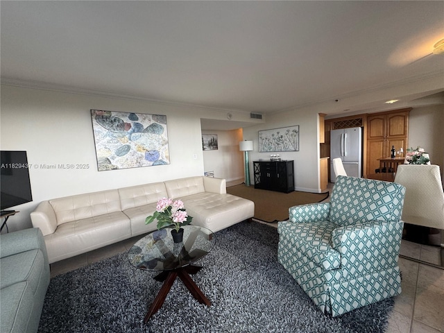 2555 Collins Ave Unit 2002, Miami Beach, FL 33140 - living room with crown molding and light tile patterned flooring