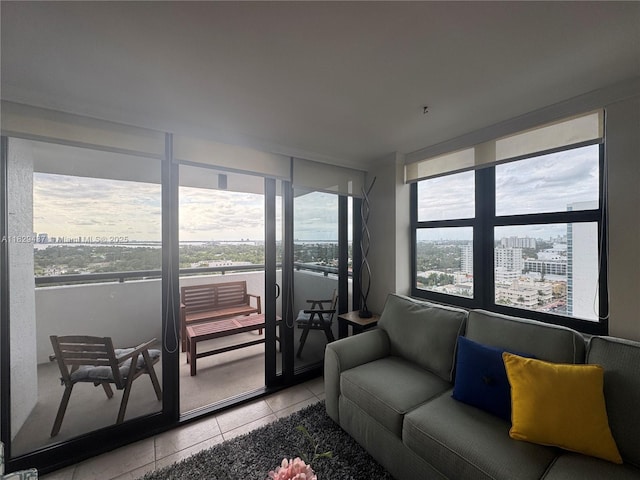 2555 Collins Ave Unit 2002, Miami Beach, FL 33140 - living area with light tile patterned flooring and a view of city