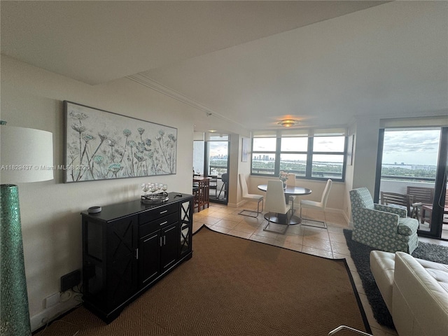2555 Collins Ave Unit 2002, Miami Beach, FL 33140 - dining space with light tile patterned floors and baseboards