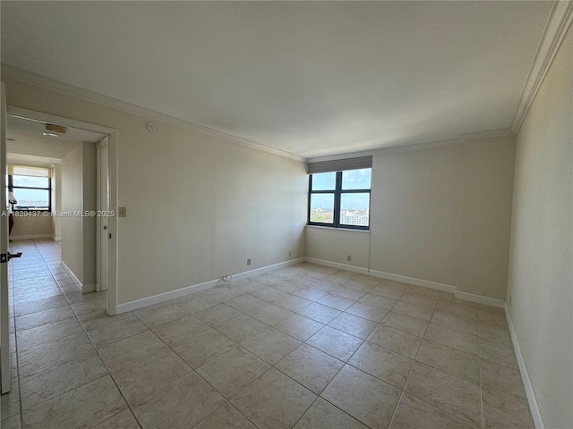 2555 Collins Ave Unit 2002, Miami Beach, FL 33140 - spare room with ornamental molding and light tile patterned floors