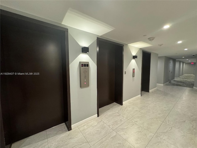 2555 Collins Ave Unit 2002, Miami Beach, FL 33140 - hall featuring elevator and recessed lighting