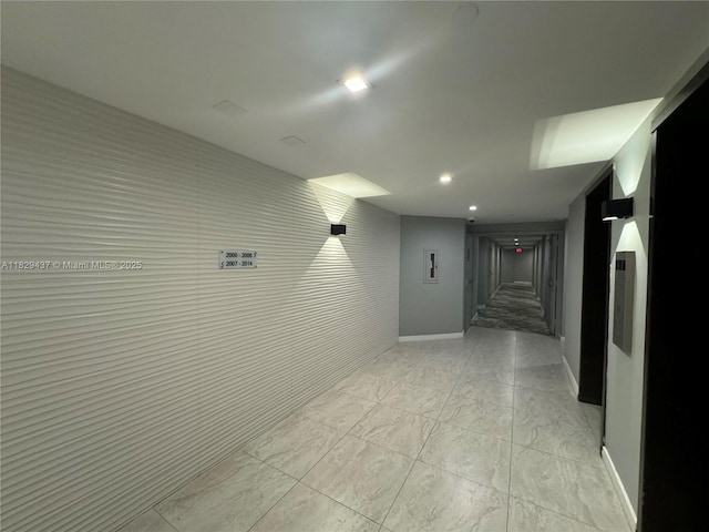2555 Collins Ave Unit 2002, Miami Beach, FL 33140 - corridor with baseboards and recessed lighting