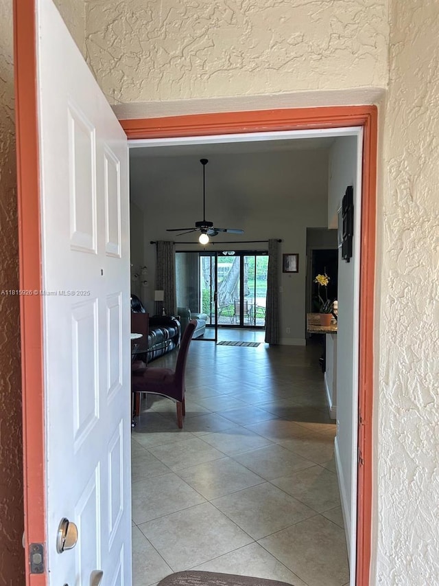 126 Centennial Ct, Deerfield Beach, FL 33442 - corridor with a textured wall and light tile patterned flooring