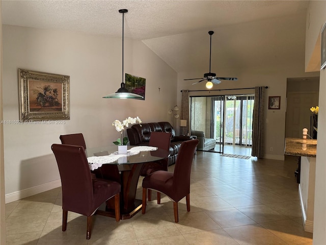 126 Centennial Ct, Deerfield Beach, FL 33442 - dining room with high vaulted ceiling, a ceiling fan, light tile patterned floors, and a textured ceiling