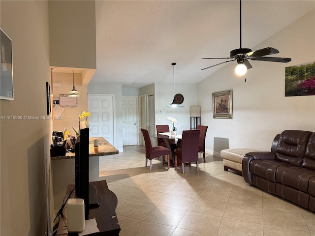 126 Centennial Ct, Deerfield Beach, FL 33442 - living room featuring a ceiling fan, light tile patterned floors, and lofted ceiling