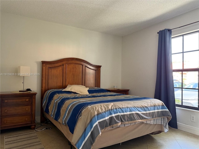 126 Centennial Ct, Deerfield Beach, FL 33442 - bedroom featuring tile patterned floors and a textured ceiling