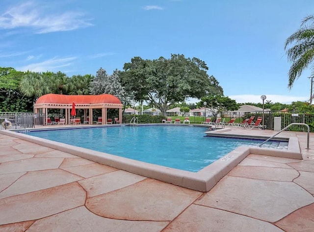 126 Centennial Ct, Deerfield Beach, FL 33442 - community pool with a patio