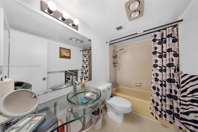 3161 S Ocean Dr Unit 1510, Hallandale Beach, FL 33009 - full bathroom with shower / tub combo with curtain, tile patterned floors, and vanity