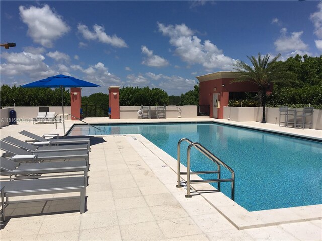 4100 Salzedo St Unit 910, Coral Gables, FL 33146 - community pool featuring a patio area