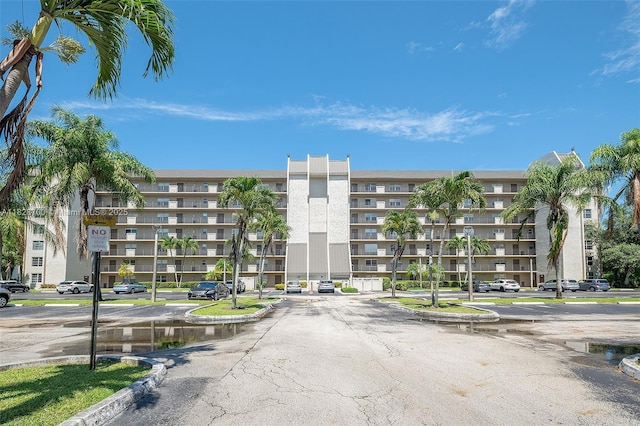 3150 W Rolling Hills Cir Unit 307, Davie, FL 33328 - view of apartment building / complex featuring uncovered parking