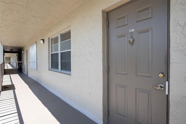 3150 W Rolling Hills Cir Unit 307, Davie, FL 33328 - property entrance with stucco siding