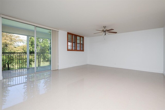 3150 W Rolling Hills Cir Unit 307, Davie, FL 33328 - unfurnished bedroom with ensuite bath, light tile patterned floors, and ceiling fan